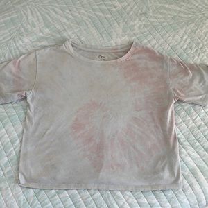 Cream and white tye dye shirt girls . Not that bright reason for price.